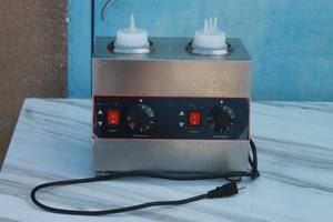 lot 94 image: SAUCE HEAT PREESERVATION MACHINE D2019-2 WITH TWO 650ML 3-HOLE&nbsp SQUEEZE BOTTLES&nbsp
