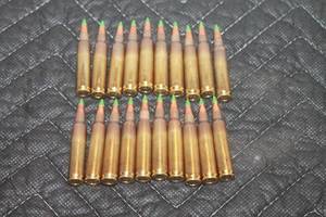 lot 34 image: TOTAL OF 20 GREEN TIP RIFLE CATRIDGES  OUT OF THE BOX