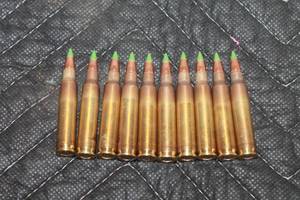 lot 35 image: TOTAL OF 10 GREEN TIP RIFLE CARTRIDGES  OUT OF THE BOX
