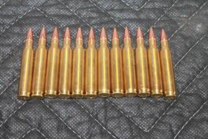 lot 36 image: TOTAL OF 12 HORNADY 223 REM RIFLE CARTRIDGES