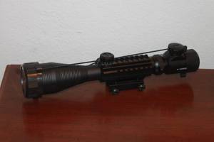 lot 49 image: TACTICAL RIFLE SCOPE 4-16 X 50 EG REDGREEN ILLUMINATION  WITH INTEGRATED SCOPE MOUNT  13L