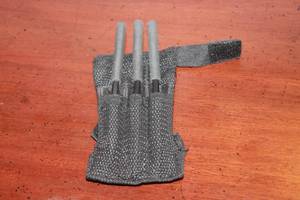 lot 51 image: TOTAL OF 3 BLACK THROWING 6 CARBON STEEL SPIKE DARTS WITH WRIST SHEATH