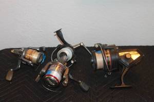 lot 61 image: TOTAL OF 4 FISHING SPINNING REELS - PRO-TOUCH, MITCHELL, OPTIX ,ALPHA  SEE PICS