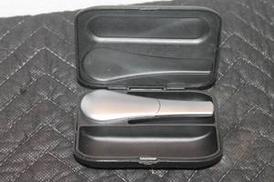 lot 67 image: SILVER METAL SMOKING  PIPE WITH CARRY CASE
