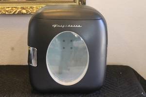 lot 70 image: FRIGIDAIRE EFMIS462 COMPACT DORM TABLETOP MINI BLACK  REFRIGERATOR COMES WITH POWER ADAPTER FOR HOME AND CAR