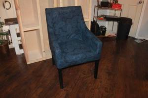 lot 110 image: BLUE KVILLSFORS ARMLESS WINGBACK  CHAIR