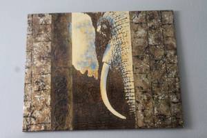 lot 116 image: VERY LARGE ELEPHANT HEAD AND TUSK AGAINST TEXTURED EARTH -TONED BACKGROUND WALL ART