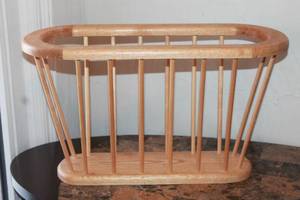 lot 107 image: MCM WOODEN SPINDLE MAGAZINE RACK