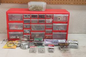 lot 138 image: RED PLASTIC 21- DRAWER STORAGE ORGANIZER WITH GENEROUS AMOUNT OF ASSORTED HARDWARE  SEE PICS