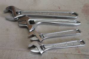 lot 161 image: TOTAL OF 4 ASSORTED BRAND ADJUSTABLE WRENCHES - 6 , 8 10