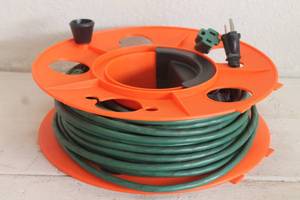 lot 158 image: TOTAL OF 2 GREEN EXTENSION CORDS  25 FT EACH WITH CORD REEL