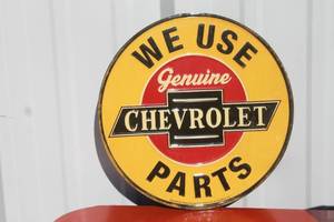 lot 40 image: GENERAL MOTORS METAL WALL SIGN , 12 DIAM