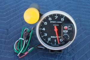 lot 44 image: AUTO METER  SPORT-COMP SHIFT-LITE TACHOMETER