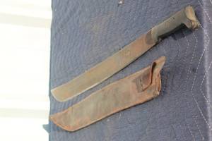 lot 121 image: VINTAGE 29 MACHETE WITH CHICAGO LEATHER SHEATH