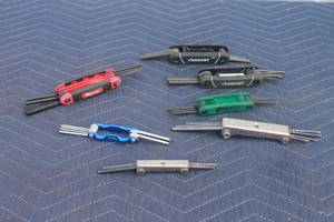 lot 206 image: TOTAL OF 7 ASSORTED BRAND FOLDING HEX KEYS  SEE PICS