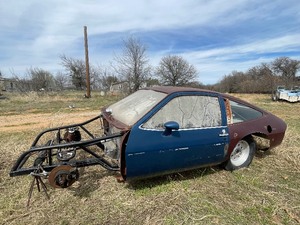 lot 236 image: SEE VIDEO ATTACHED1970S BUICK SKYHAWK  PROJECT  RACING CAR WITH GENEROUS AMOUNT OF CAR PART ACCESSORIES - FENDERS , HOOD,CONSOLE,BIG BLOCK VALVE COVERS ,STEERING WHEEL &amp LOTS MORE   SEE PICS