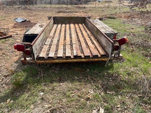 lot 242 image: FLAT BED TRAILER 1OFT  X 6 FT  REFER TO PROVIDED IMAGES FOR  REMOVING THE ITEMSEE VIDEO ATTACHED
