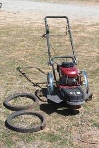 lot 284 image: CRAFTSMAN 917773753 GAS POWERED WALK BEHIND STRING TRIMMER  TIRES NEED REPLACING  SEE PICS