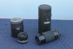 lot 6 image: TOTAL OF 2 CANON CAMERA LENSES ,(80-20MM) 905864 &amp (FD 50MM ) 704597 WITH STORAGE LENSE CASES&nbsp