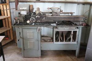 lot 174 image: CRAFTSMAN COMMERCIAL LATHE WITH ASSORTED LATHE ACCESSORIES ON METAL LATHE CABINET  SEE PICS&nbsp