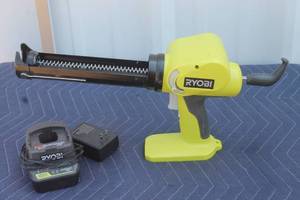 lot 201 image: RYOBI P310G&nbsp 18V POWER PISTAL GRIP CAULK AND ADHESIVE GUN WITH CHARGER&nbsp