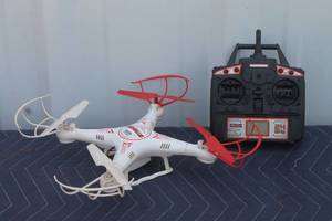 lot 248 image: WORLD TECH TOYS STRIKER SKYDRONE WITH REMOTE&nbsp