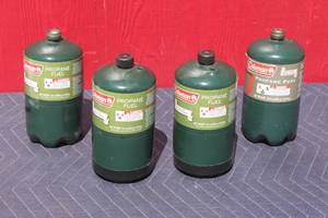 lot 34 image: TOTAL OF  4 - COLEMAN PROPANE FUEL  2-FULL 2-USED (16.4 OZ )