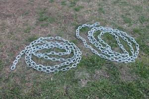 lot 99 image: TOTAL OF 2 HEAVY DUTY COIL 15FT CHAINS