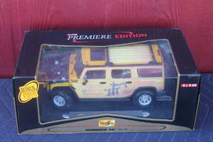 lot 112 image: MAISTO PREMIERE EDITION 118 YELLOW HUMMER H2 SUV , 36631 IN ORIGINAL BOX
