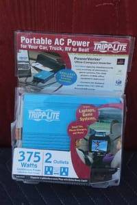 lot 119 image: TRIPP- LITE 375 WATTS - 2-OULETS PORTABLE AC POWER VERTER IN ORIGINAL BOX