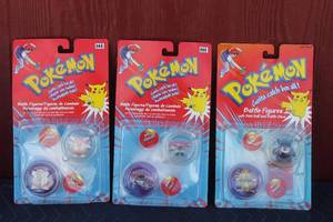 lot 131 image: VINTAGE POKEMON GOTTA CATCHEM ALL BATTLE FIGURES WITH POKEBALL AND BATTLE DISC  SEE PICS