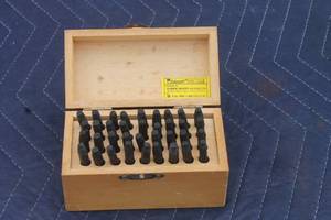 lot 231 image: PITTSBURGH 36 PC  HIGH CARBON STEEL METAL PUCH LETTERS & NUMBER STAMPING SET  IN WOOD STORAGE CASE