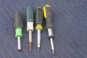 lot 236 image: TOTAL OF 4  ASSORTED BRAND MULTI BIT SCREWDRIVERS
