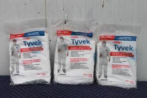 lot 303 image: TOTAL OF 3  DUPOINT TYVEK FULL COVERAGE  DURABLE & BREATHABLE PARTICULATE  PROTECTION  2XL