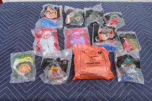 lot 326 image: TOTAL OF 12 VINTAGE MC DONALDS ASSORTED HAPPY MEAL TOYS TY BABIES  SEE PICS