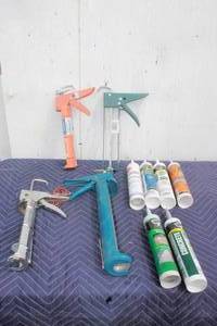 lot 327 image: TOTAL OF 4 CHALK GUNS WITH LOT OF  CHALKING TUBES
