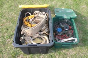 lot 443 image: MISC LOT OF ASSORTED LIFTING SLING ,POSITIONING LANYARD ,ROPES & ASSORTED WIRES , AND  STRAPS   TOTES INCLUDED  SEE PICS