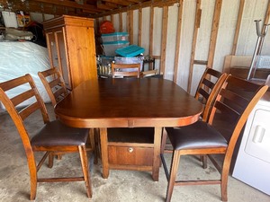 lot 424 image: TAWEI FURNITURE DINIG TABLE WITH LEAF & BOTTOM STORAGE  AND 6- LEATHER SEAT  BAR HEIGHT COUNTER  CHAIRS ,(  54 L WITHOUT LEAF  70 L WITH LEAF X 4FT X 3FT  HEIGHT )