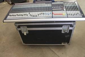 lot 101 image: SOUNDCRAFT GB8 32 CHANNEL MIXING CONSOLE IN ROADIE CASE ON CASTERS POWERS ON&nbsp