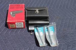 lot 35 image: BUSHNELL PROFESSIONAL BORE SIGHTER 74-3002 WITH 2- BUSHNELL EXPANDABLE ARBORS & CARRY CASE