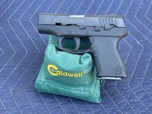 lot 24 image: TAURUS MILLENIUM PT-111 CAL 9MM PISTOL , SN TBT89418