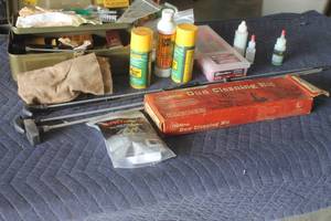 lot 159 image: LOT OF PISTOLRIFLE USED CLEANING SUPPLIES WITH VINTAGE METAL STORAGE CASE   SEE PICS