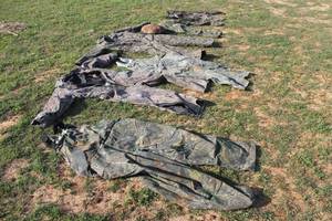 lot 163 image: LOT OF ASSORTED SIZE CAMOUFLAGE SUITS, COVERALLS ,OVERALLS ,AND PANTS  SEE PICS