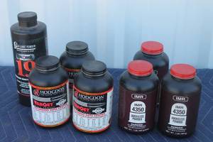lot 78 image: TOTAL OF 7 USED BOTTLES OF RIFLE POWDER
