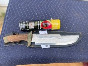 lot 38 image: VINTAGE STAINLESS PAKISTAN  BRASS HANDLE BOWIE 18 KNIFE WITH LEATHER SHEATH