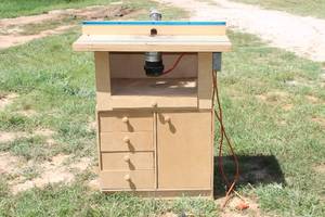 lot 152 image: ROCKWELL MANF Co 2001 ROUTER BASE TYPE 1 WITH HANDMADE WOODEN ROUTER TABLE BASE CABINET AND&nbsp ATTATCHED POWER STRIP OUTLETS  SEE PICS&nbsp