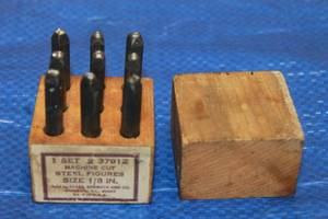lot 38 image: SEARS ROEBUCK AND CO&nbsp 1-SET 937912 MACHINE CUT STEEL FIGURES SIZE 18 ( 9PC ) IN WOOD STORAGE CASE&nbsp