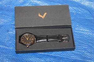 lot 214 image: STYLIZED V LOGO BLACK LEATHER BAND QUARTZ WATCH ,IN ORIGINAL BOX&nbsp