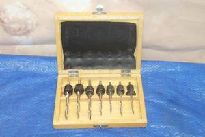 lot 219 image: HSS TAPERED DRILL COUNTERSINK BORE &amp STOP COLLAR SET IN WOOD STORAGE CASE&nbsp