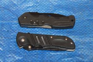 lot 63 image: TOTAL OF 2 MILLERS CREEK BLACK FOLDING POCKET KNIVES&nbsp